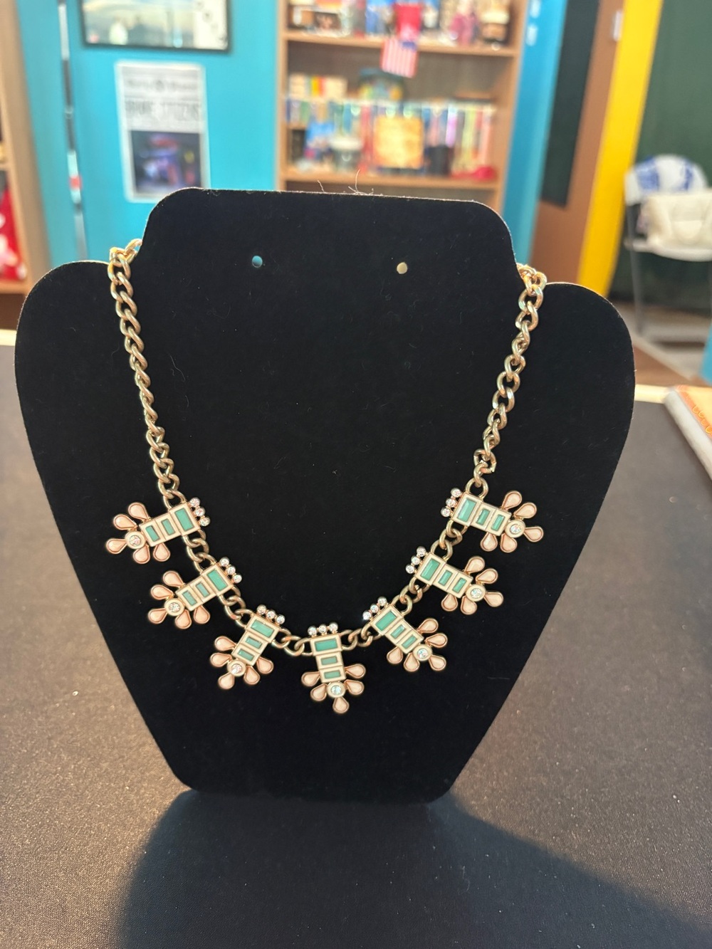 Plunder Gold Tone Necklace with Mint Green Enamel Accents